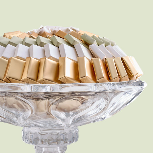 Bohemian crystal round stand top view showing circular arrangement of assorted nougats