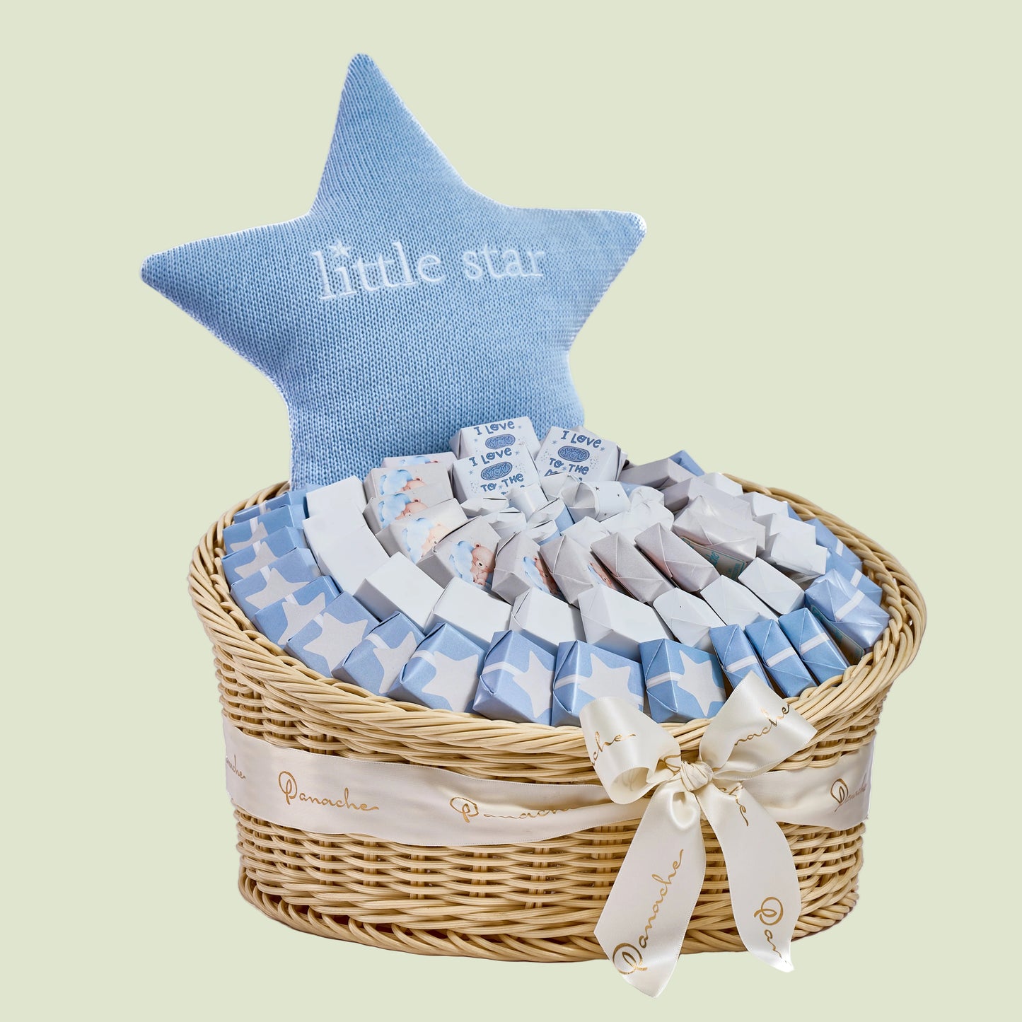 Baby boy star gift basket side view showing blue and white wrapped chocolates in circular arrangement