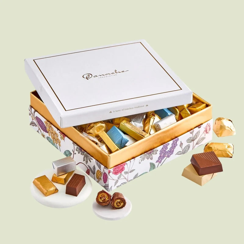 Panache floral gift box, open to reveal individually wrapped chocolates